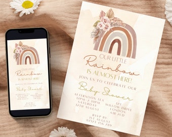 May include: A baby shower invitation with a watercolor rainbow design. The invitation features a rainbow with muted tones of brown, beige, and gray. The text reads "Our Little Rainbow is Almost Here!" and includes details for the baby shower, including the date, time, and location. RSVP information is also included.
