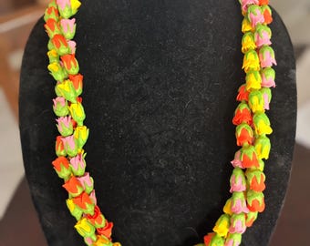 3-strand lokelani (Rose) lei- yellow, orange, and pink.