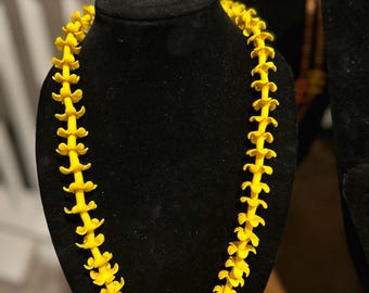 Puakenikeni lei - Yellow