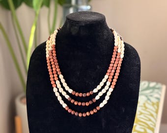 3-strand varied length sandalwood (‘iliahi), rosewood beads and pikake necklace