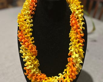 Three-strand multi-shade Puakenikeni lei - Free domestic shipping!