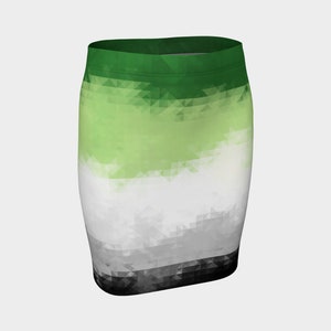 May include: A pencil skirt featuring a geometric design in shades of green, white, gray, and black. The skirt has a high waist and a form-fitting silhouette. The design is made up of small triangles.