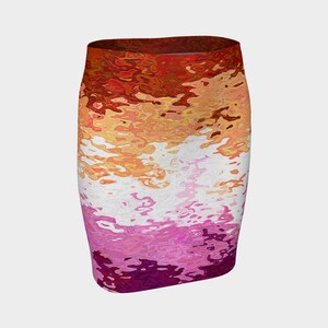 May include: A skirt with a colorful abstract design featuring shades of red, orange, yellow, white, pink, and purple. The design resembles a liquid swirl pattern.