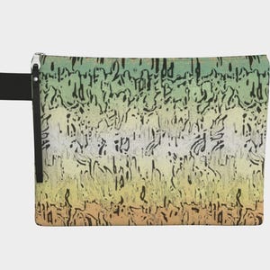 May include: A rectangular zippered pouch with a gradient design in shades of green, yellow, and orange, overlaid with black abstract shapes. It has a black wrist strap attached to the side.