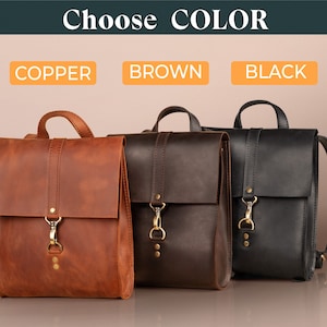 May include: Leather backpacks in copper, brown, and black. Each bag has a flap closure with a metal clasp and a top handle. The text "Choose COLOR" is at the top, with color options below.