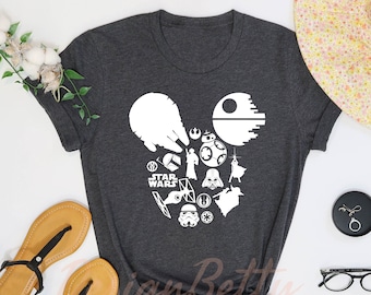 May include: Dark gray heather t-shirt with a white graphic of a Mickey Mouse head made up of Star Wars characters and the words "Star Wars".