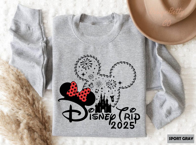 a gray shirt with a minnie mouse on it