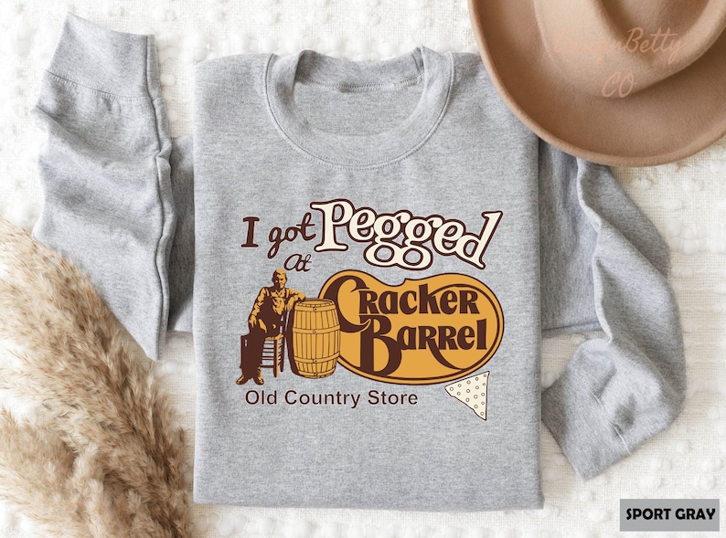 a t - shirt that says i got pegged on it