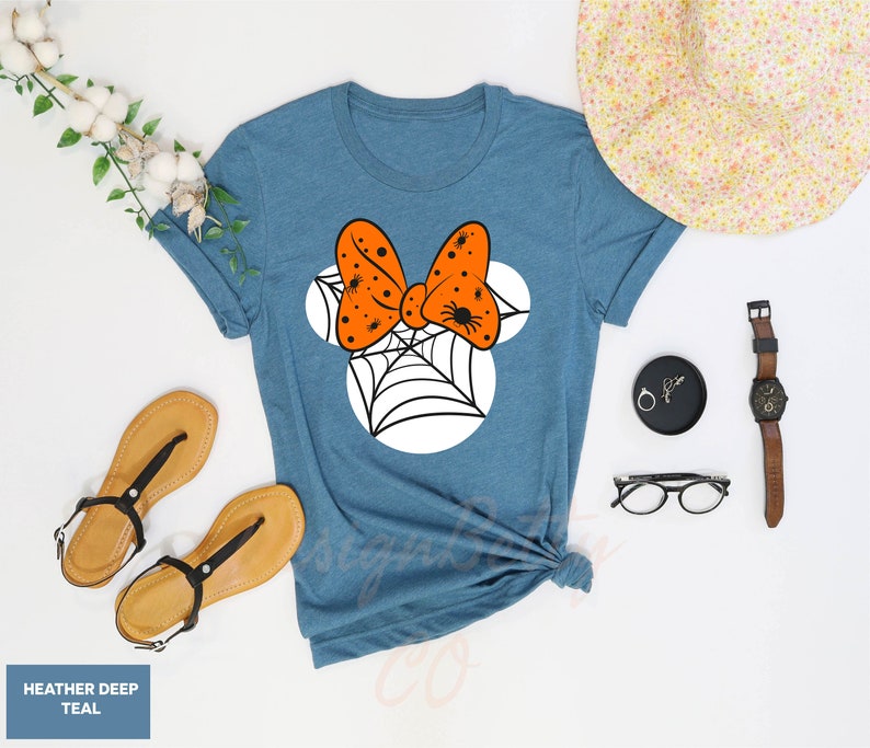 a t - shirt that has a bow on it