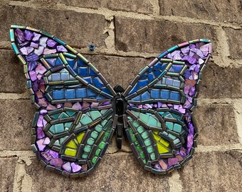 12” x 9” mosaic butterfly in black, purple, blue, and green