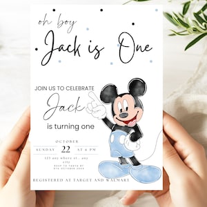 May include: A birthday invitation featuring Mickey Mouse. The invitation reads "oh boy Jack is One" and includes the text "Join us to celebrate Jack is turning one" with the date and time. The invitation is registered at Target and Walmart.