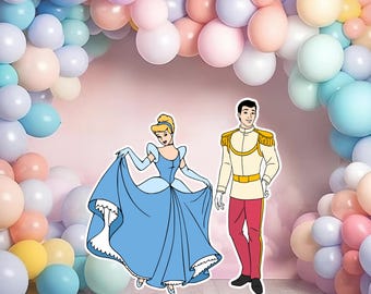 May include: A blue and white princess dress with a yellow crown and a blue and gold prince costume. The characters are standing in front of a wall decorated with pastel balloons.