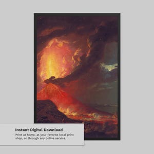 May include: A framed print of a dramatic volcano erupting, with fiery red and orange lava and smoke billowing into a dark, cloudy sky. The artwork is a digital download, ready to print at home or at a local print shop.