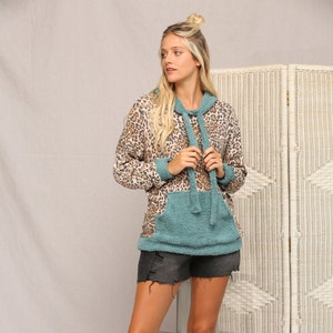 Wild & Cozy: Animal Print Waffle Hoodie for Trendy Comfort image 1