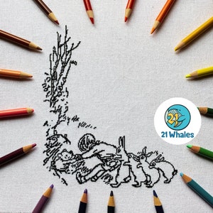 May include: A black and white cross-stitch design of a character from a children's book, surrounded by coloured pencils on a white canvas. The design features a character with a hat and a group of rabbits. The logo "21 Whales" is in the bottom right corner.