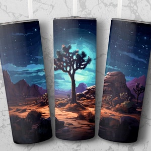May include: Three stainless steel tumblers featuring a desert night scene. The tumblers depict a Joshua tree, mountains, and a starry sky with a full moon.