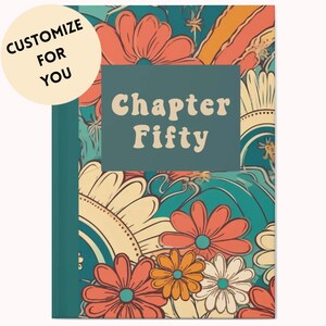 May include: A hardback book with a teal rectangular centre panel featuring the text Chapter Fifty in cream letters. The cover is decorated with a vibrant floral pattern in shades of orange, cream, and teal. A circular tag reads CUSTOMIZE FOR YOU.