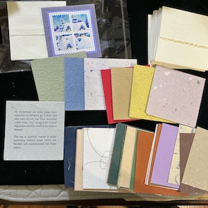 Papeterie St-Armand card pack includes 7 cards, 8 envelopes from rag paper, stack of small papers in different colors and designs.