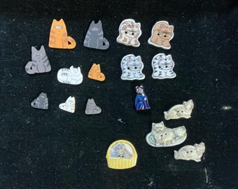 17 different cat buttons. 8 are ceramic, 8 are double sided and 1 moulded with faux diamond eyes. A couple different collections. New