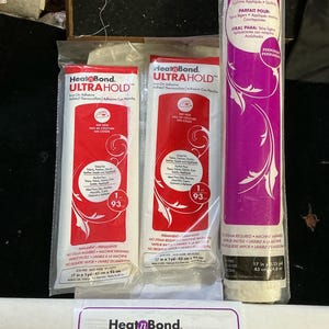 May include: An assortment of HeatnBond adhesive products for fabric crafts. Includes two UltraHold packages, a roll of UltraHold, and a Lite Sewable package. The UltraHold packages are 17 inches by 1 yard (43 cm x 93 cm). The roll is 17 inches by 5.25 yards (43 cm x 4.8 m).