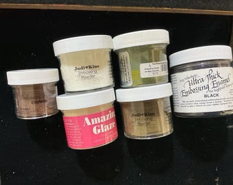 6 embossing powders including 3 from Judi Kin’s, Ranger, Ultra thick embossing enamel by Suze Weinberg and 1 by Bmuse.