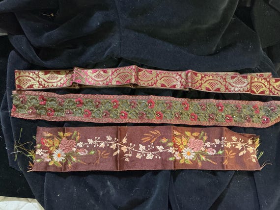 3 different trims. I’m not sure of the material. Maybe rayon or polyester. 1 has beads and sequins. See description for sizes. New