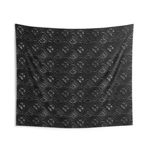 May include: Black and white tapestry featuring a repeating pattern of ornate, stylised flowers. The pattern is embossed, giving the tapestry a 3D effect.