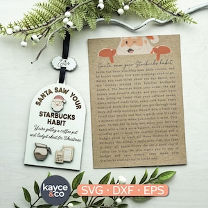 May include: A white arched wooden ornament with a black ribbon and a small tag labelled Ellis. It features a Santa icon, the text Santa Saw Your Starbucks Habit, and wooden cutouts of a coffee pot and calculator. Next to it is a tan card with text.