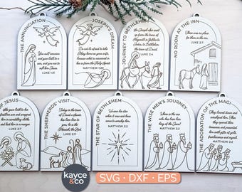 May include: A collection of laser-cut wooden Christmas ornaments. Each ornament features a biblical scene from the Nativity story, including angels, the journey to Bethlehem, and the adoration of the Magi. The ornaments are designed with a minimalist style.