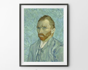 May include: Framed print of a portrait of a man with a red beard and blue eyes, wearing a blue suit. The background is a swirling blue pattern. The print is in a black frame. The text "l'amour Art Studio" is at the bottom.