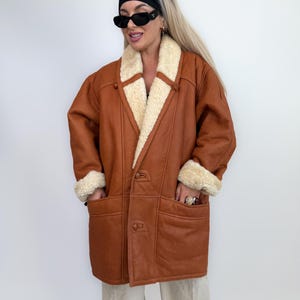 Cappotto in montone e shearling color cognac vintage, giacca invernale in pelle foderata in lana, da uomo e da donna immagine 10