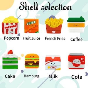 Puede incluir: Una colecci&oacute;n de ocho estuches peque&ntilde;os y coloridos con tem&aacute;tica de comida bajo el t&iacute;tulo Shell selection. Los art&iacute;culos incluyen palomitas, zumo, patatas fritas, caf&eacute;, tarta, hamburguesa, leche y cola, cada uno con una cara sonriente.