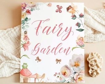 May include: A rectangular sign with the words "Fairy Garden" in pink script, surrounded by watercolor illustrations of fairies, flowers, and butterflies. The sign also includes the text "Will There Be Cakes" and a website address.