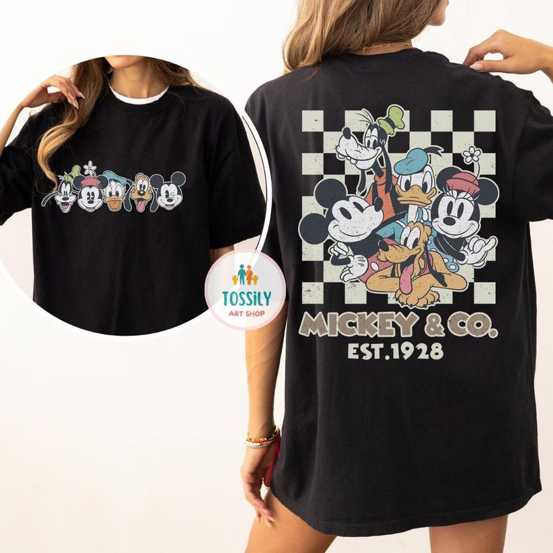 May include: Black t-shirt featuring a graphic of Mickey Mouse and friends. The front of the shirt displays the characters, while the back showcases a checkered design with the text "Mickey & Co. EST.1928".