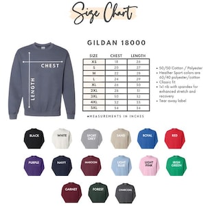 May include: A size chart for Gildan 18000 sweatshirts, with chest and length measurements in inches. The chart includes sizes XS to 5XL. The image also displays a blue sweatshirt and a color palette of available sweatshirt colours.