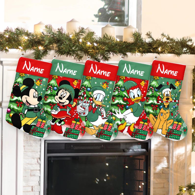 May include: Five Christmas stockings with Disney characters Mickey Mouse, Minnie Mouse, Donald Duck, and Pluto. Each stocking has a red cuff with the word "Name" and a green body with Christmas tree and gift box designs.