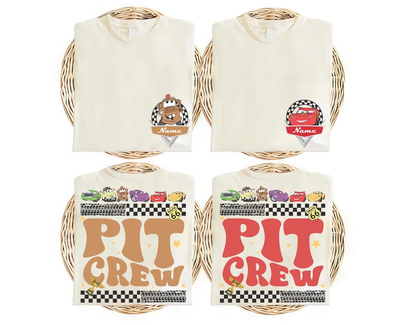 May include: Four cream-colored t-shirts with colorful graphics. Two shirts feature car-themed designs with the word "Name" and a checkered flag. The other two shirts have the words "PIT CREW" in large, retro fonts, with car illustrations and Route 66 signage.