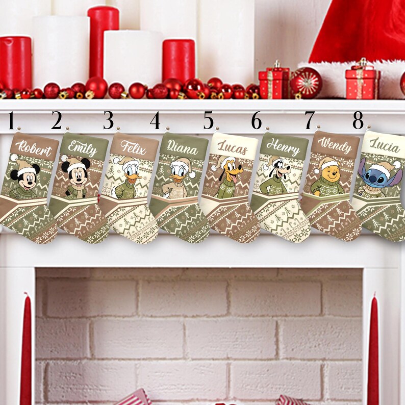 May include: Eight Christmas stockings with Disney character designs, each personalized with a name. The stockings feature characters like Mickey Mouse, Donald Duck, and Winnie the Pooh, with a festive pattern in shades of green, brown, and cream.