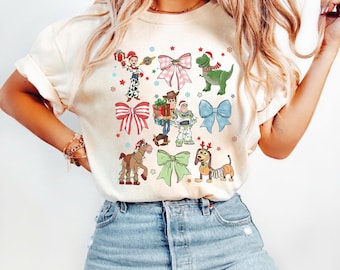 Disney Toy Story Coquette Bows Christmas Shirt, Toy Story You've Got A Friend In Me Shirt, Disney Xmas Woody Jessie Slinky Alien Buzz Tee