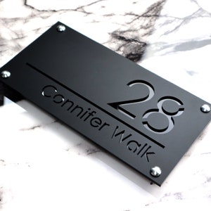 House Wall Plaques UK | Luxe A4 | Modern Laser Cut Door Plaque House Number Plaque | Matt Black & Black Mirror | 280mm x 140mm