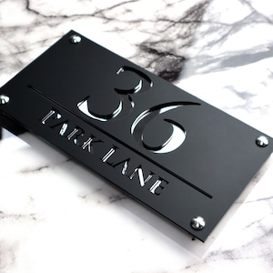 House Wall Plaques UK | Luxe A4 | Stylish Laser Door Plaque | Modern Acrylic | Custom House Numbers Sign Black & Silver Mirror | 28cm x 14cm