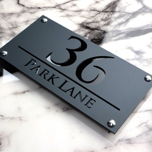 House Wall Plaques UK | Luxe A4 | Modern House Number Signs | Elegant Acrylic Design | Outdoor Home Décor Grey & Black Gloss | 28cm x 14cm