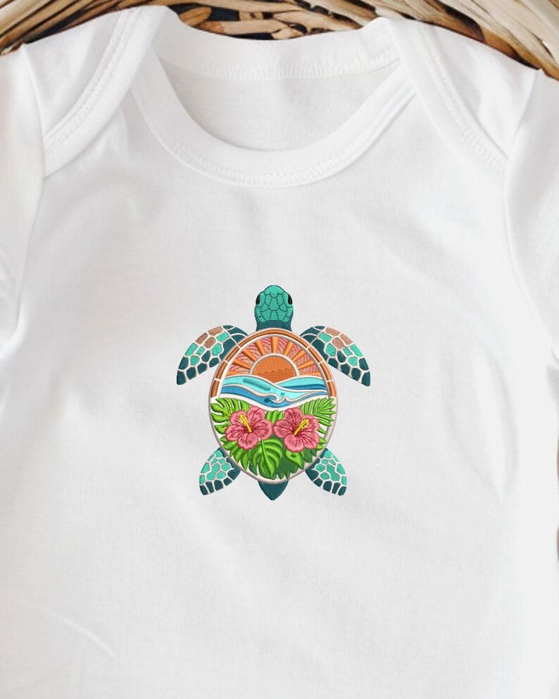 May include: White baby onesie with a colorful sea turtle design. The turtle features a teal head and flippers, with a design of a sunset, waves, and hibiscus flowers on its shell. The onesie is made of soft, white fabric.