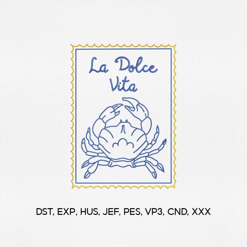 May include: A blue and gold embroidered design featuring a crab illustration and the text "La Dolce Vita" in a stamp-like frame. The design is on a white background. The text is in a cursive font.