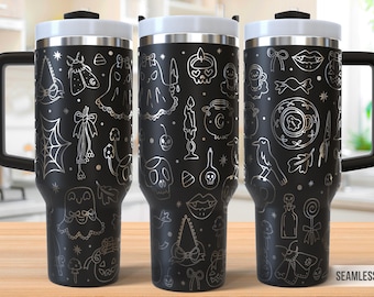 May include: Three black travel mugs with white lids and black handles. Each mug is decorated with silver-colored Halloween-themed illustrations, including ghosts, bats, and skulls. The mugs are on a wooden surface.