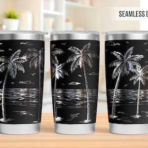 May include: Three stainless steel tumblers with a black background and a silver palm tree design. The design includes a silver ocean wave at the bottom of the tumbler.