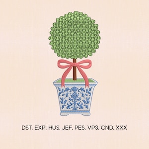 May include: An embroidered design of a topiary tree in a blue and white planter. The tree has a green, rounded top and a brown trunk, tied with a pink bow. The planter features a blue floral pattern. The background is a light beige color.