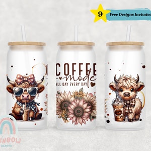 May include: Three white stainless steel tumblers with a brown wood lid and a straw. Each tumbler features a different design. One tumbler has a cartoon highland cow wearing sunglasses and a scarf, another has a sunflower design with the text "Coffee Mode All Day Every Day", and the last tumbler has a cartoon highland cow holding a coffee cup.