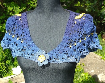 Small refined blue and yellow cape in handmade crochet cotton lace