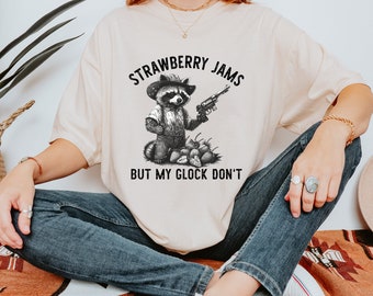 Strawberry Jams But My Glock Dont cowboy Funny Raccoon Tee, Funny Meme Comfort Colors® T-Shirt memes gift idea bff friends oddly specific